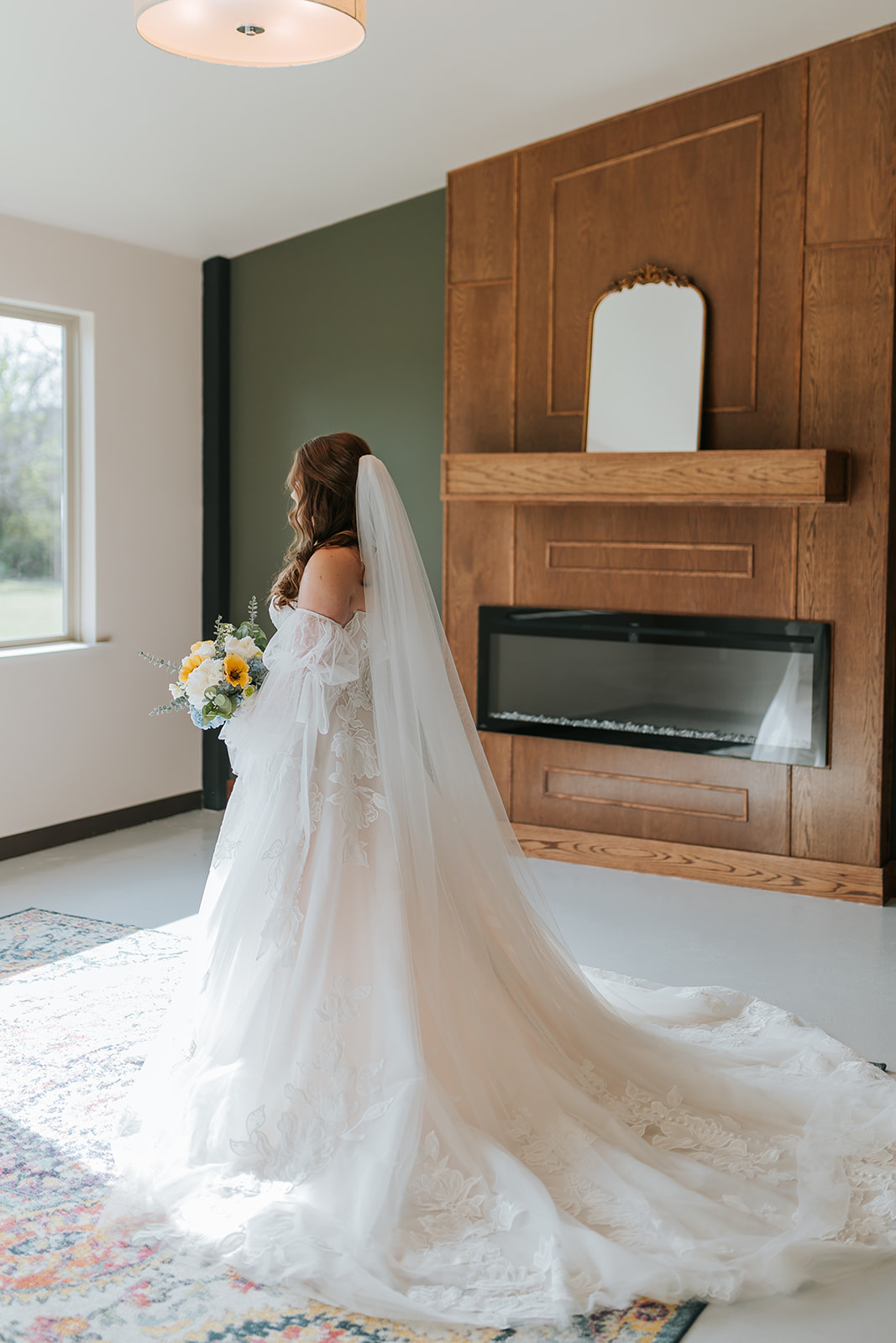 Bride getting ready in the bridal suite at Hidden Creek at StoneHaus in Belton, Texas